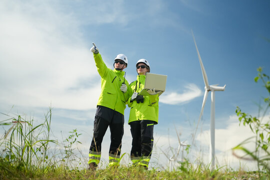 Renewable energy exploration wind farm business meeting outdoor environment dynamic viewpoint sustainability concepts