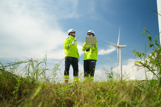 Wind energy innovations renewable energy site informative meeting outdoor close-up view sustainability efforts