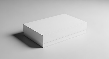 White rectangular box with lid on gray surface with shadow image