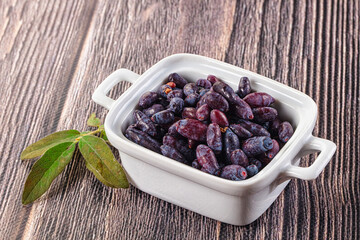 Sweet juicy ripe honeysuckle berries