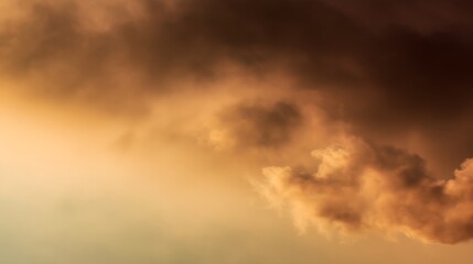 Naklejka premium Thick smoke cloud drifting across a warm sunset sky.