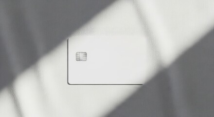 Minimalist White Credit Card Mockup with Shadow Overlay.