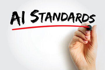 AI Standards handwritten with a marker by hand, concept of artificial intelligence guidelines, frameworks, and ethical or educational benchmarks