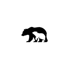Silhouette of a bear and cub walking together isolated on white background