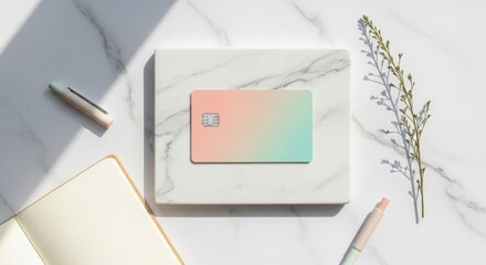 Pastel Credit Card on Marble with Notebook and Pen.