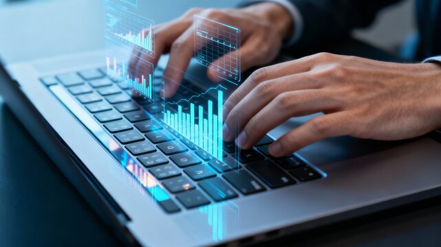 Hands Typing on Laptop with Holographic Financial Data Overlay in Digital Productivity Scene