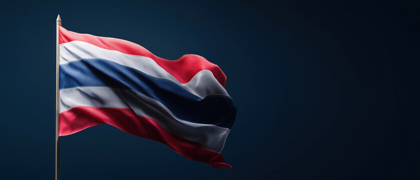 Majestic Flag of Thailand Waving Gracefully Against a Dark Background
