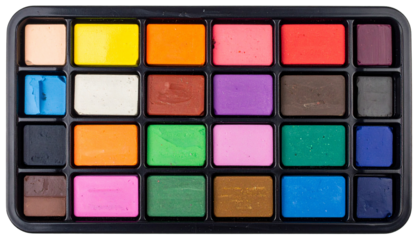Overhead shot of a plastic palette containing an array of rectangular art paints