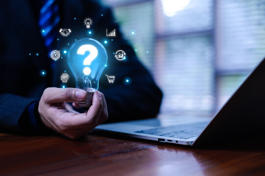 Creative idea concept with a glowing lightbulb featuring a question mark, symbolizing inspiration, curiosity, problem-solving, innovative thinking for business strategy and modern digital creativity.