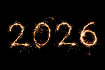 2026 written with Sparkle firework on black background, happy new year 2026 concept