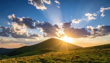 Sunrise over mountain with sun rays, nature landscape, blue sky, and clouds.