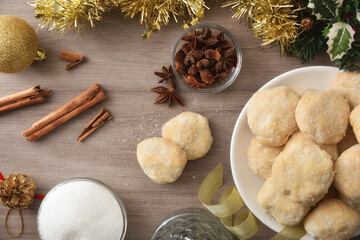 Anise and cinnamon cookies on wooden table top view