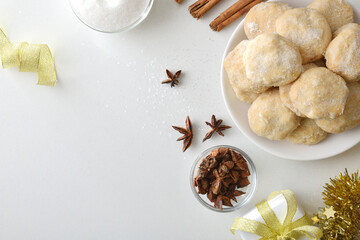 Anise and sugar cookies on festive white table top view