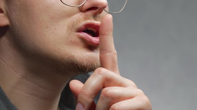 Don't shout and speak in a whisper.
Shh is a finger gesture.
Please don't speak loudly and maintain silence.
A finger to the mouth is a silence gesture.