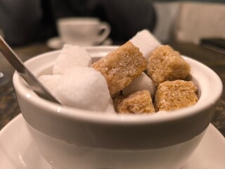 Variety of sugar cubes in plate