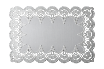 High-contrast white lace doily on black backdrop