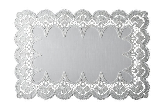 High-contrast white lace doily on black backdrop
