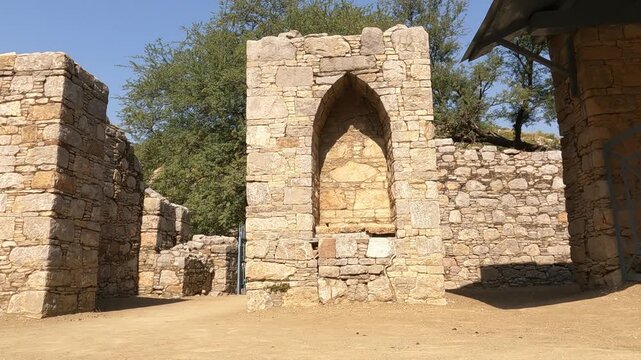 mohra muradu taxila pakistan entrance arch showing placement of ancient buddha sculptures