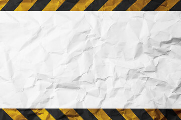 Yellow and black warning bar on white crumpled paper background with copy space, design for caution, danger warning.