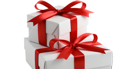 Elegant white gift boxes stacked with vibrant red ribbons, perfect for holiday promotions and joyful celebrations, conveying thoughtfulness and care