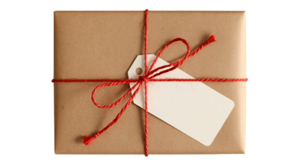Beautifully wrapped gift box with blank tag and festive red twine ready for personalization, conveying warmth and thoughtful giving