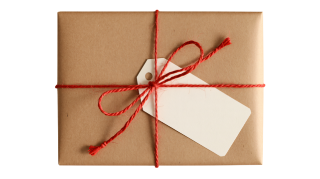 Beautifully wrapped gift box with blank tag and festive red twine ready for personalization, conveying warmth and thoughtful giving
