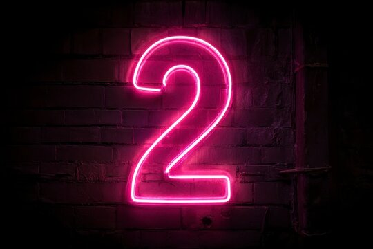 Neon Pink Number Two Light Sign on a Dark Background