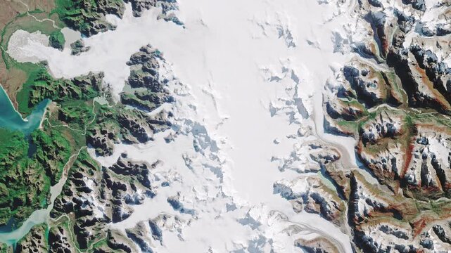 Aerial shot of north Patagonia. Ice, glaciers and mountains covered with snow. Camera is zooming in, rotating counterclockwise. Animation based on image by NASA