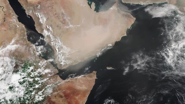 Aerial view on Arabian peninsula. Desert in tropics, dry regions. Camera is zooming in, rotating counterclockwise. Animation based on image by NASA