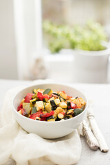 Grilled vegetables on plate with spices and herbs