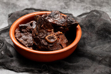 Chanfana a traditional Portuguese dish made of slow-cooked goat stewed in red wine