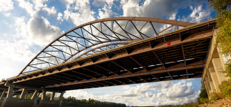Dramatic panoramic view of the Veterans Memorial Bridge over the Missouri River at St. Charles, MO from below