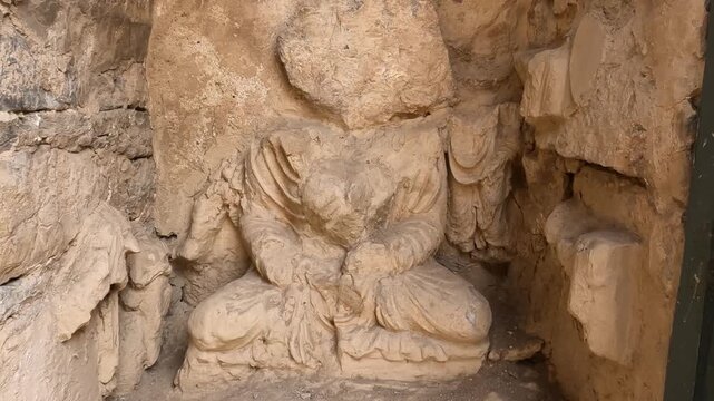 mohra muradu taxila pakistan gandhara monastery view with buddha sculpture flanked by disciples
