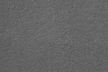 grey gray silver stucco wall texture, peach fuzz color background. Abstract artistic backdrop for design. Salmon color, monochrome plaster, exterior wall building texture pattern
