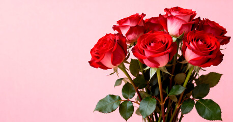 A banner with an empty space for text, a bouquet of red roses with green leaves on a pink background. The roses are bright and fresh, showing off their classic beauty.