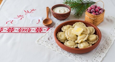 Traditional dumplings served with sour cream and cranberries  