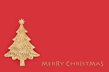 Merry Christmas gold tree festive decoration with phrase on red background. Minimal Xmas design for...