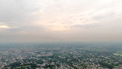 Top down Buildings and Apartment with Multiple Building aerial. Urban Buildings and Apartment at bridge road at Delhi. Cinematic cityscape drone shot. Noida Buildings.