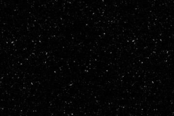 Realistic Falling Snowflakes or White Dust Particles on Black Background as an Overlay Effect or Winter Texture for Digital Composite