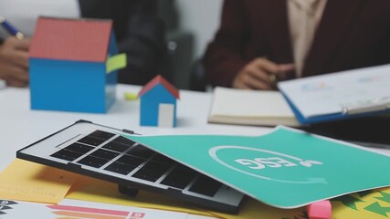 Sustainable business partners discuss renewable energy models and ESG investment strategies for a greener future - Powered by Adobe