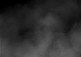 Dense white smoke or fog spreading upwards on a dark black background, creating a mysterious and atmospheric effect with abstract texture, copy space for design.