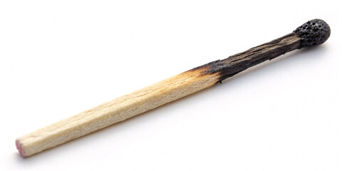 Burnt matchstick rests on a pristine white background, a potent symbol of endings, consequences, and the fleeting nature of energy