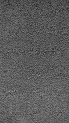 texture of black plaster on the wall