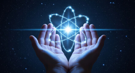 Hands gently cradle a glowing atom against a starry backdrop, symbolizing energy and innovation. The sparkling blue light enhances the sense of cosmic power and scientific discovery.