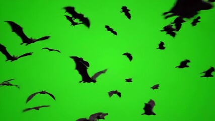 A swarm of bats silhouetted against a vibrant green background, in flight. - Powered by Adobe