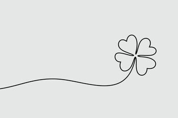 Minimalist continuous line drawing of a four leaf clover with a trailing stem