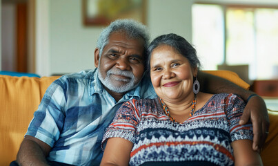 Senior Aboriginal couple in a cozy room, generated AI