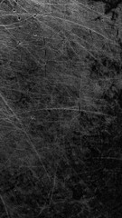 black old aluminum sheet with burnt marks from the pan