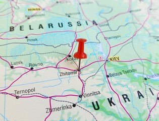 Naklejka premium View of Zhytomyr, Capital city of Zhytomyr Oblast in northwestern Ukraine, on a geographical map of Europa, marked with red pushpin