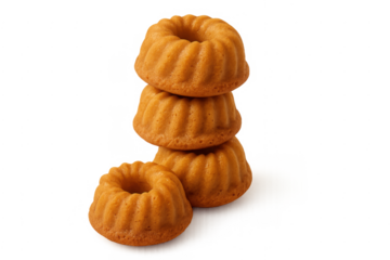 Stacked mini bundt cakes on transparent background